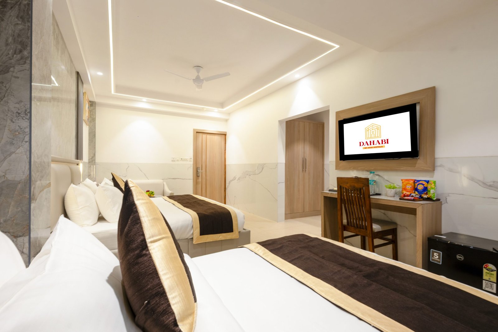 Superior room with plush bedding at Dahabi Era Aerocity